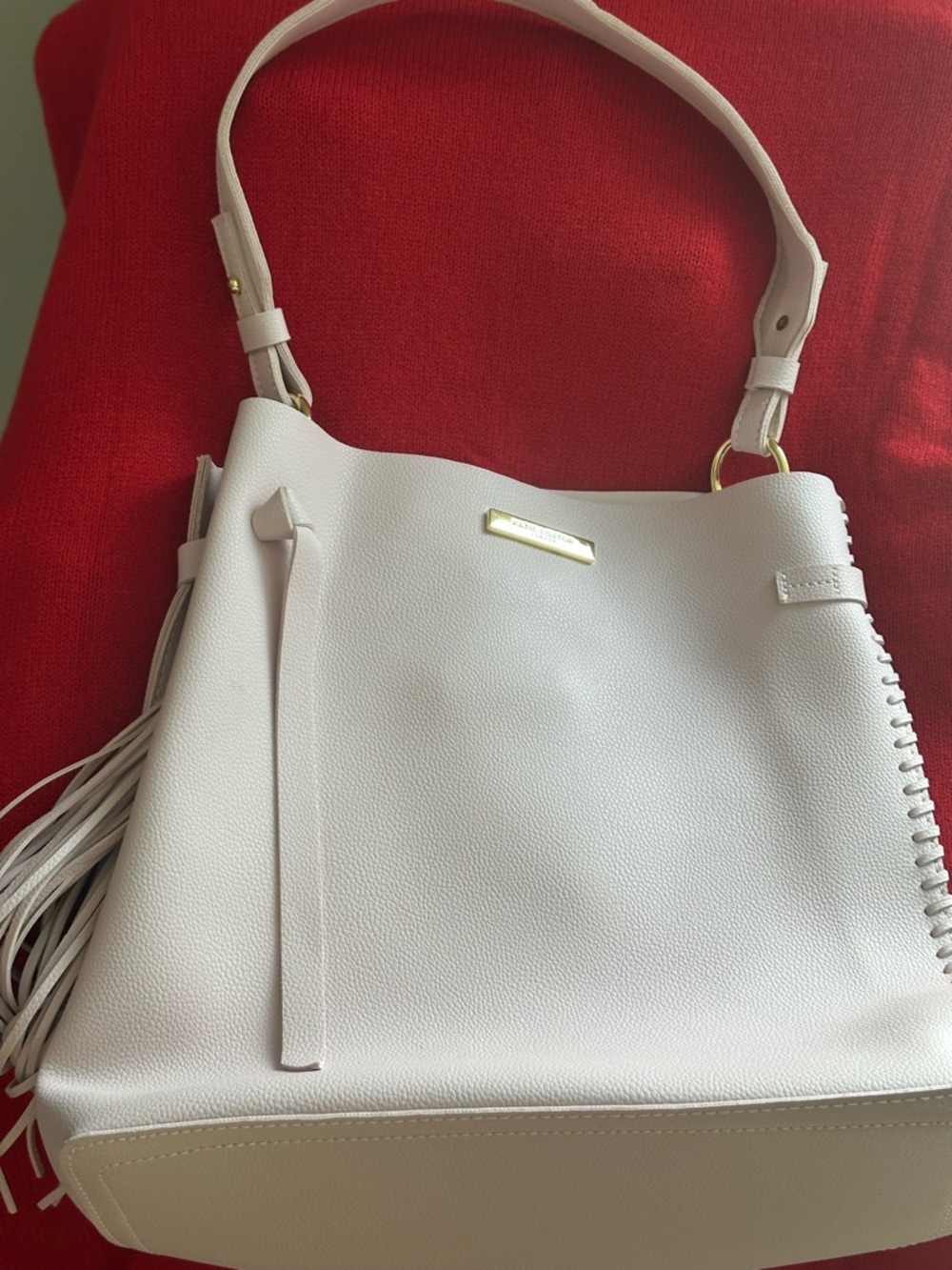 Women's White Tassel Bucket Shoulder Bag by katie loxton london